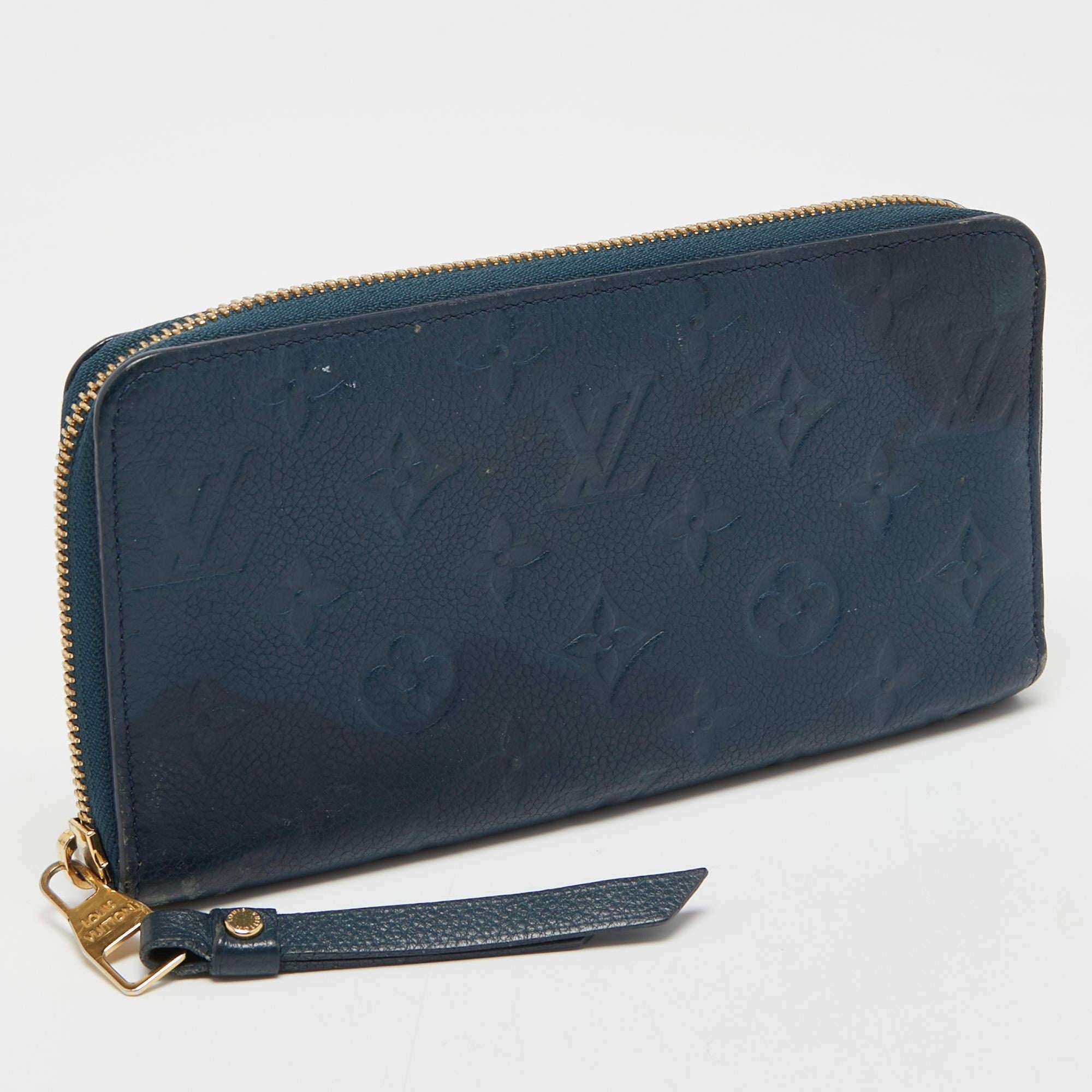 This gorgeous Louis Vuitton wallet is a stylish way to organize your monetary essentials. It features a zip fastening with card slots, compartments, and a zip pocket inside. Made from high-quality Monogram Empreinte leather, it is supple and