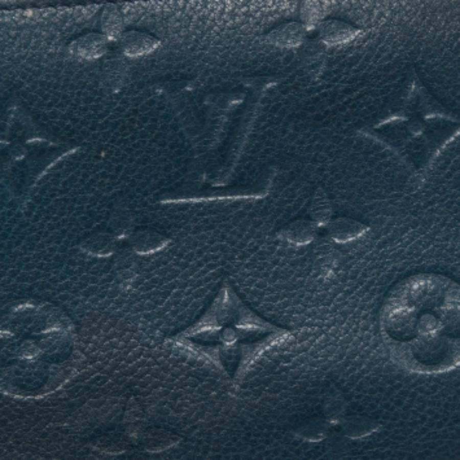 Louis Vuitton - Portefeuille à fermeture éclair en cuir avec monogramme « Empreinte » en vente 4