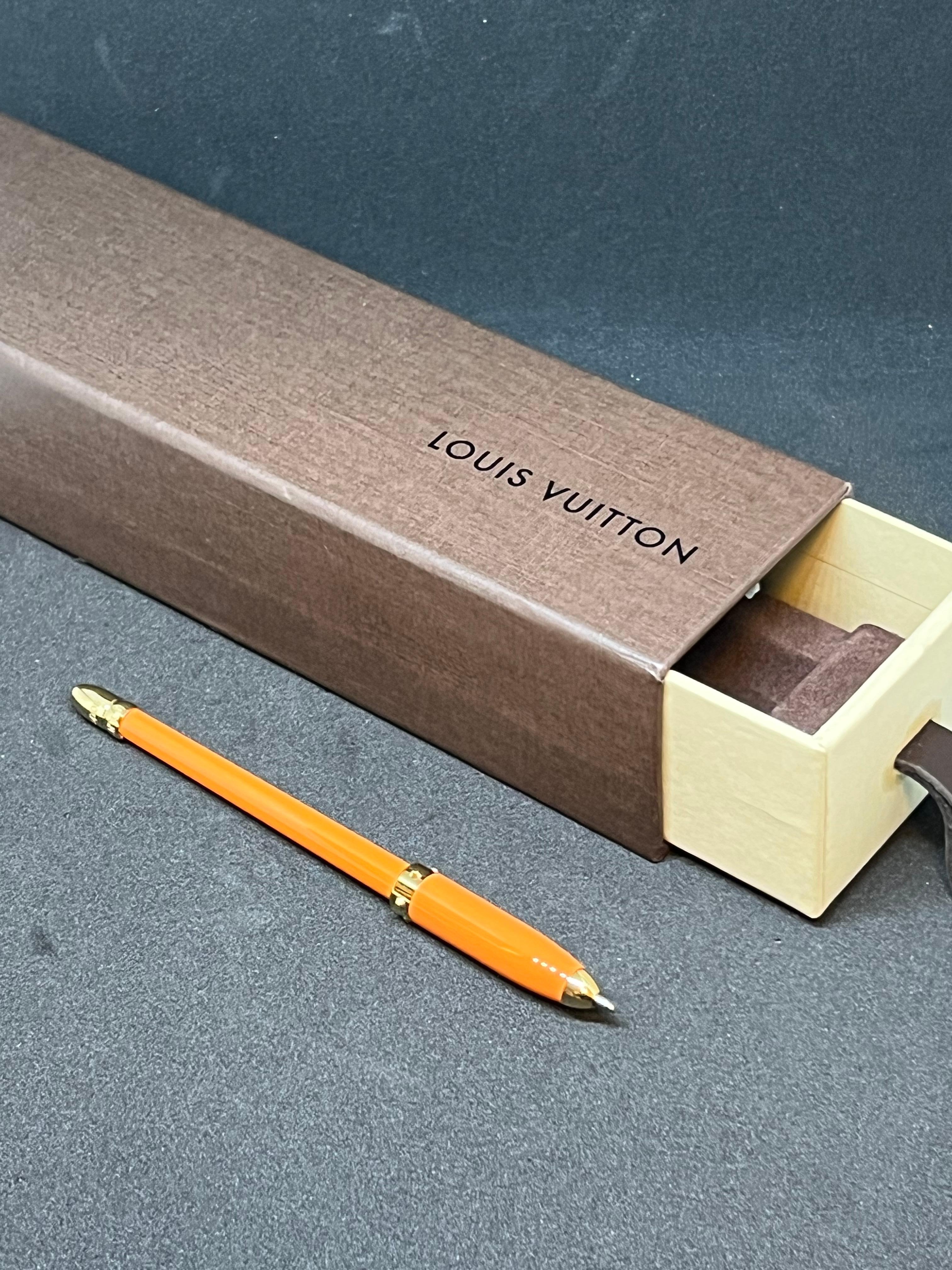 Louis Vuitton Orange and Gold Agenda chic pen   In Excellent Condition In New York, NY
