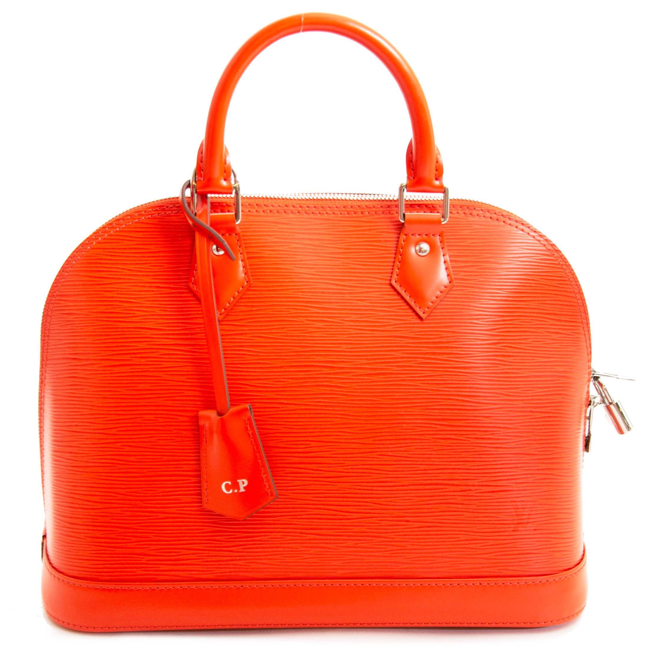 Excellent Condition

Louis Vuitton Orange Epi Alma PM

Orange is the new black! The Alma is known as a true iconic item in the Louis Vuitton family. 
This Alma is crafted in orange epi leather, epi leather equires very little care and can look new