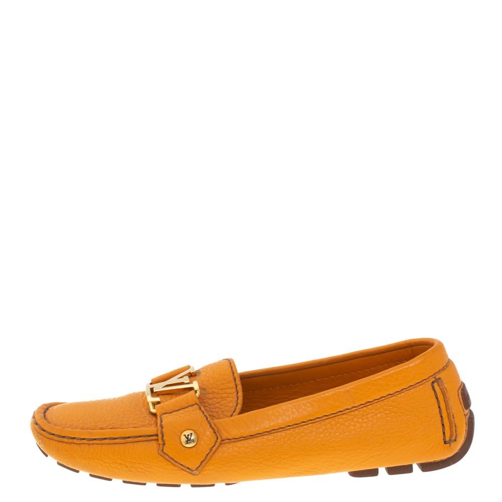 Versatile, classy, and super comfortable, these driving loafers from Louis Vuitton do deserve a place in your closet. They are eternal classics and made from leather in an orange shade. These loafers feature logo detailing on the uppers, neat