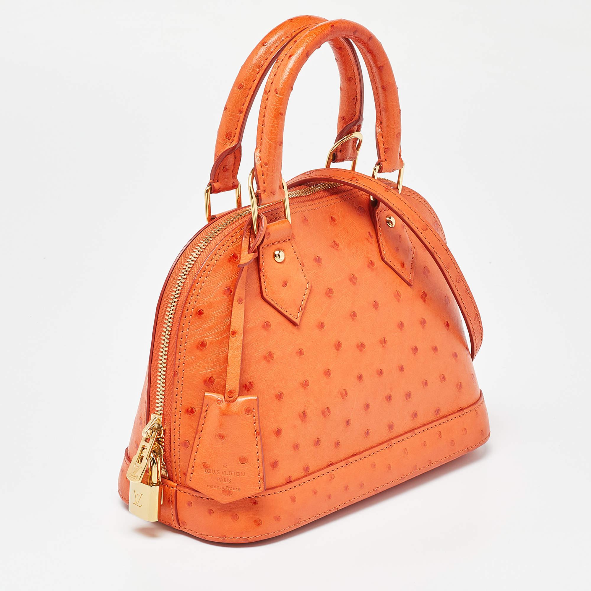 Louis Vuitton Orange Ostrich Alma BB Bag In Good Condition For Sale In Dubai, Al Qouz 2