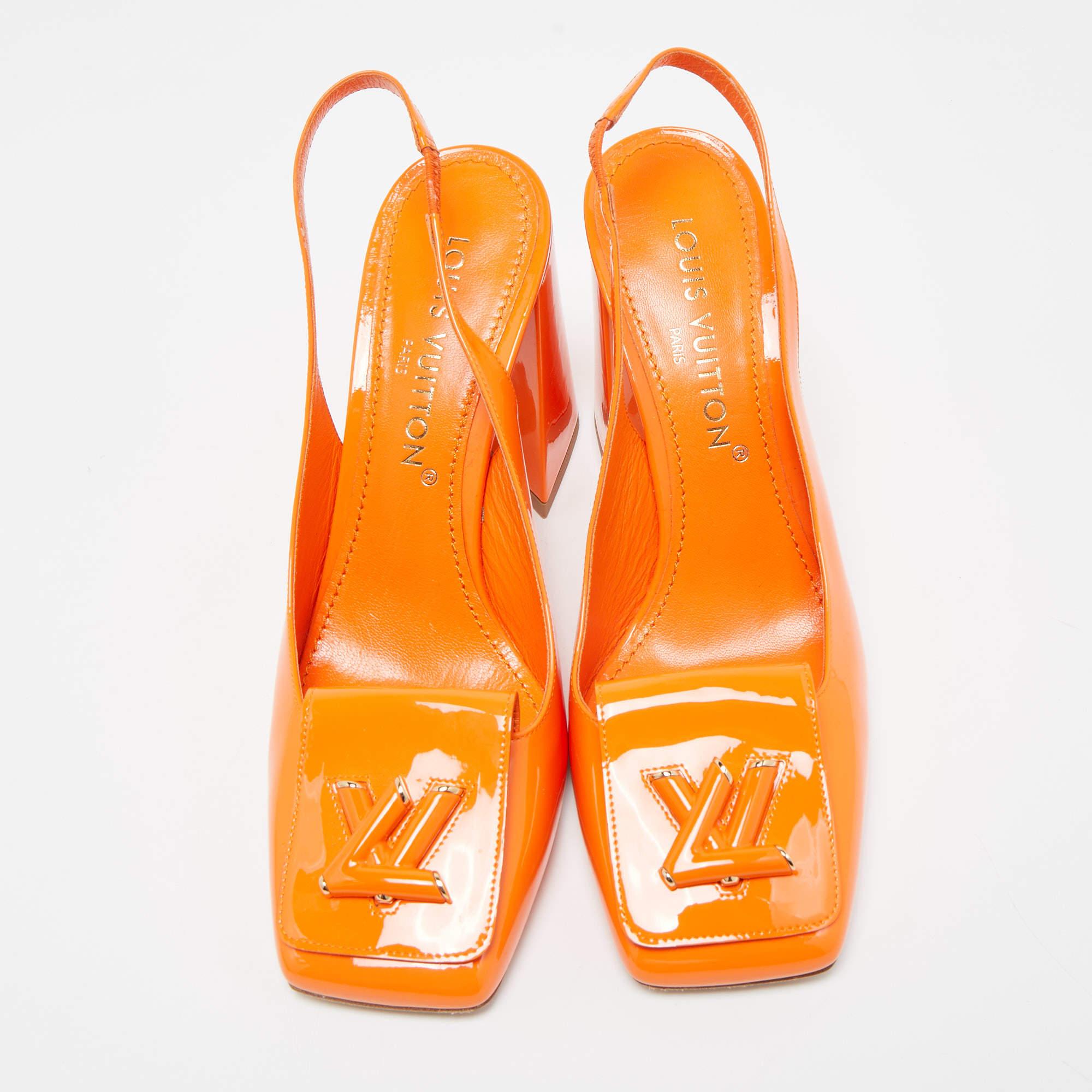 These Louis Vuitton pumps are a great choice if you’re looking to add a pair that's both classy and versatile. The pair is fashioned in orange patent leather, secured with slingbacks, and set on block heels. The LV Twist logo on the uppers adds a