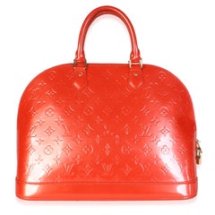 Louis Vuitton Alma GM Monogram Vernis en color naranja atardecer
