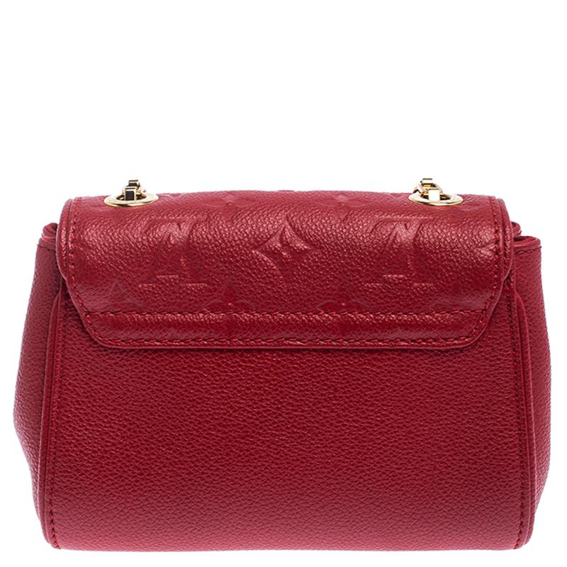 A perfect bag to instantly get recognized is this St Germain bag from Louis Vuitton. Crafted in red leather, the flap of this pretty bag is detailed with the signature Monogram Empreinte along with a gold-tone S-lock closure. The Alcantara-lined