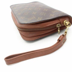 Louis Vuitton Orsay Monogram Wristlet 868482 Brown Coated Canvas Clutch