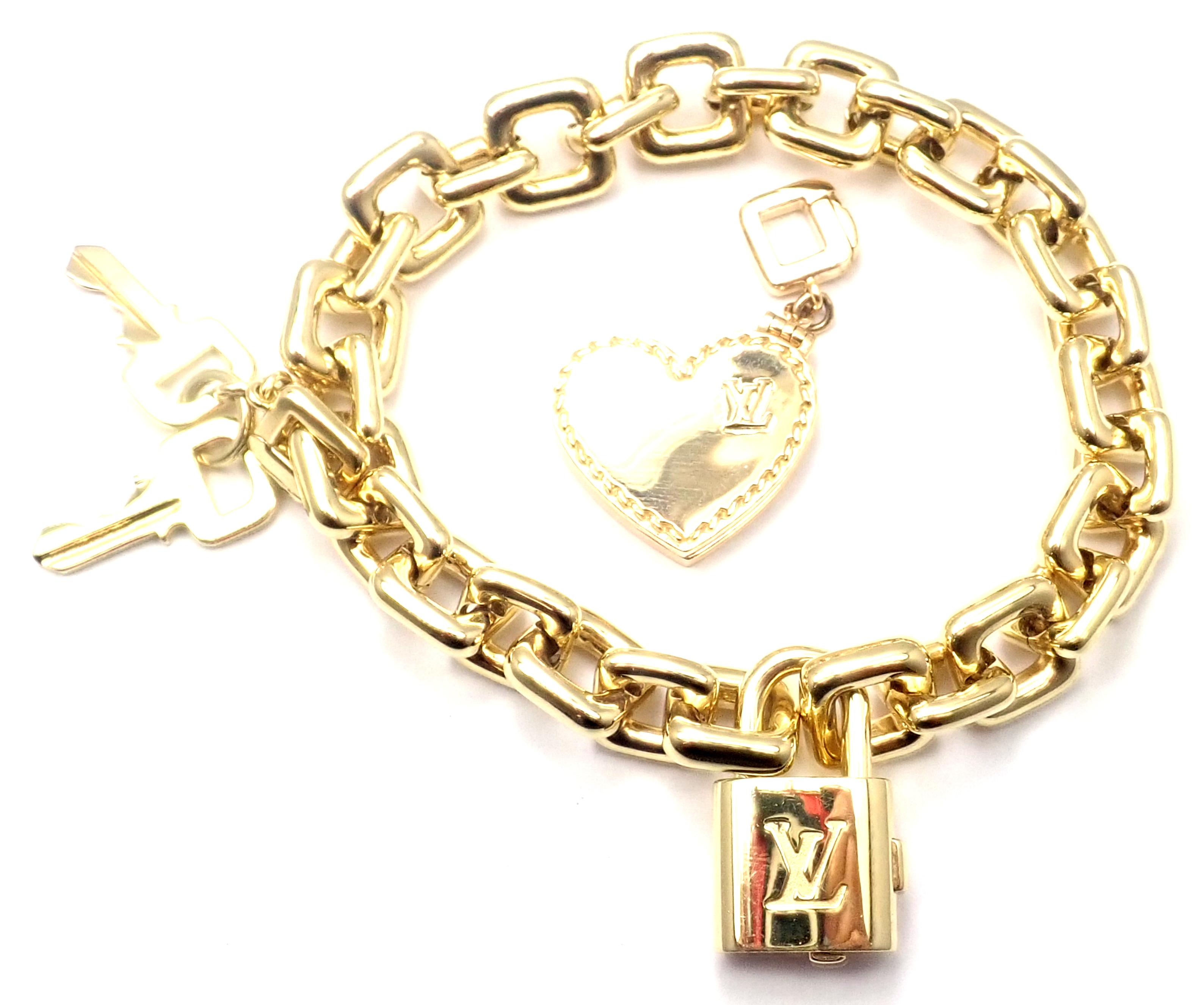 Louis Vuitton Padlock Heart Locket Charm Link Yellow Gold Bracelet In Excellent Condition In Holland, PA