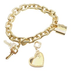 Vintage Louis Vuitton Padlock Heart Locket Charm Link Yellow Gold Bracelet