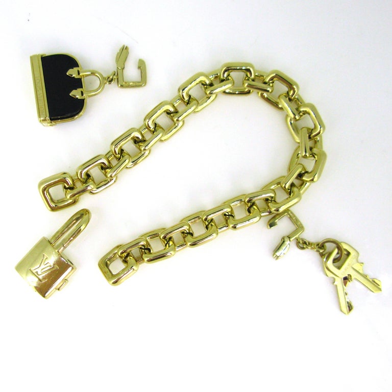 Louis Vuitton Padlock Key Onyx Bag Yellow Gold Charm Link Bracelet at ...