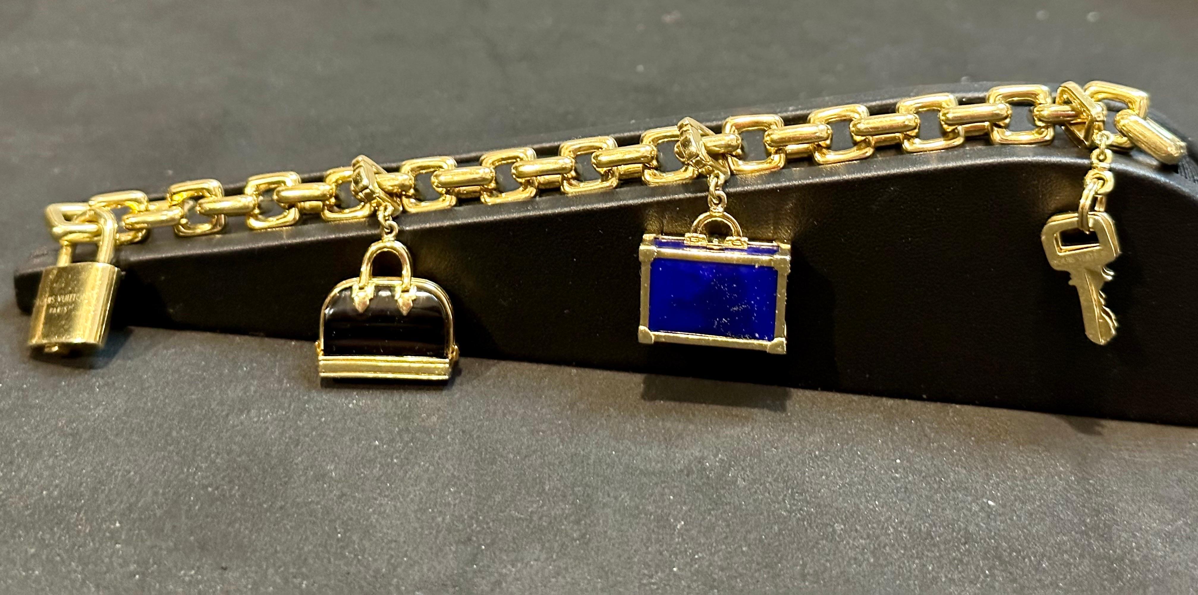Louis Vuitton Padlock & Keys+ Two Bags Charm Yellow Gold Bracelet 125.7 Gm 18 KG For Sale 12