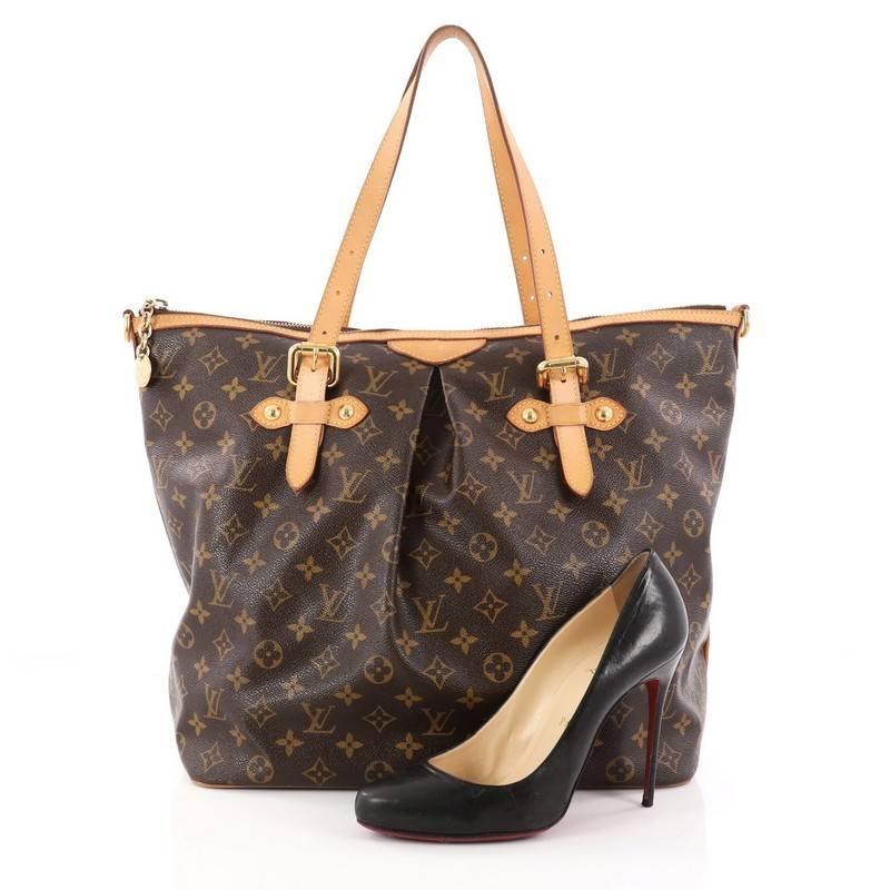 This authentic Louis Vuitton Palermo Handbag Monogram Canvas GM is a must-have for the sophisticated on-the-go woman. Crafted with Louis Vuitton's classic brown monogram coated canvas and vachetta leather trims, this beautiful bag features