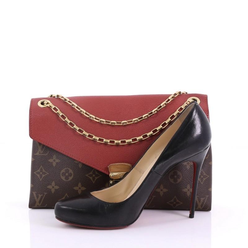 This Louis Vuitton Pallas Chain Shoulder Bag Monogram Canvas and Calf Leather, crafted from brown monogram coated canvas with red calf leather, features dual chain-link straps and gold-tone hardware. Its S-lock closure opens to a red microfiber