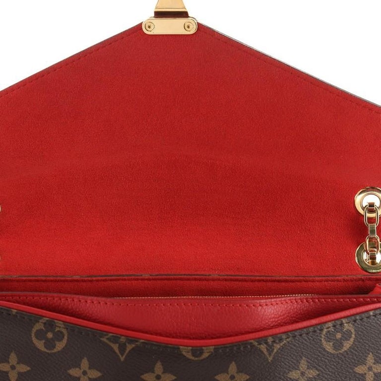 Pallas Bag Monogram canvas and red leather double hand…
