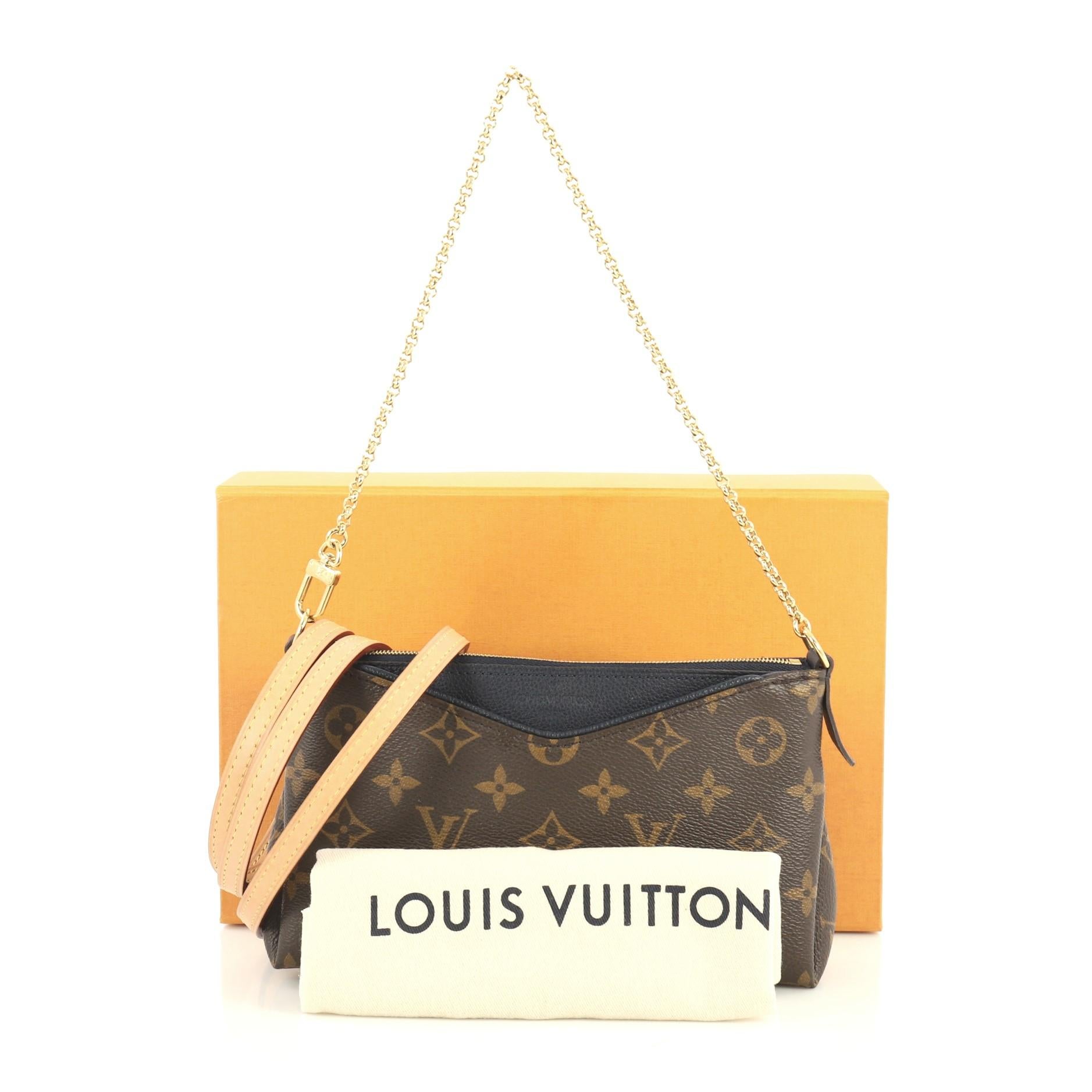 This Louis Vuitton Pallas Clutch Monogram Canvas, crafted from brown monogram coated canvas, features a short chain strap, long leather shoulder strap, exterior front slip pocket, and gold-tone hardware. Its zip closure opens to a blue fabric