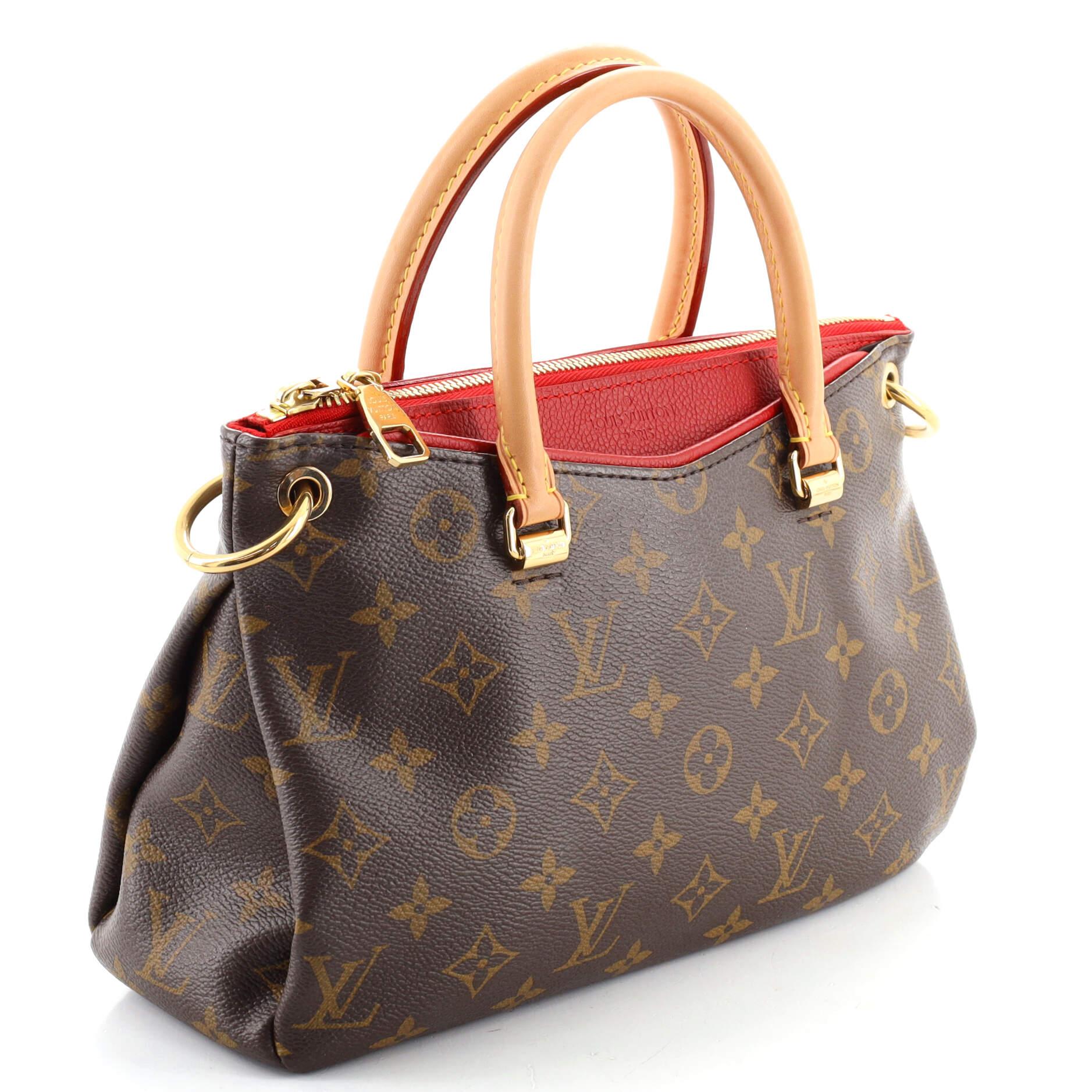 Condition: Good. Creasing on exterior and strap, minor wear on base corners, darkening, wear and watermarks on leather trims and handles. Small stains on handles, melting and indentations on strap wax edges. Wear in interior, scratches,