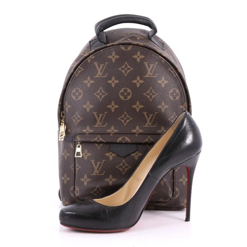 This authentic Louis Vuitton Palm Springs Backpack Monogram Canvas PM is a standout from the brand's collection made for care-free urban fashionistas. Crafted from brown monogram coated canvas, this functional backpack features padded leather top