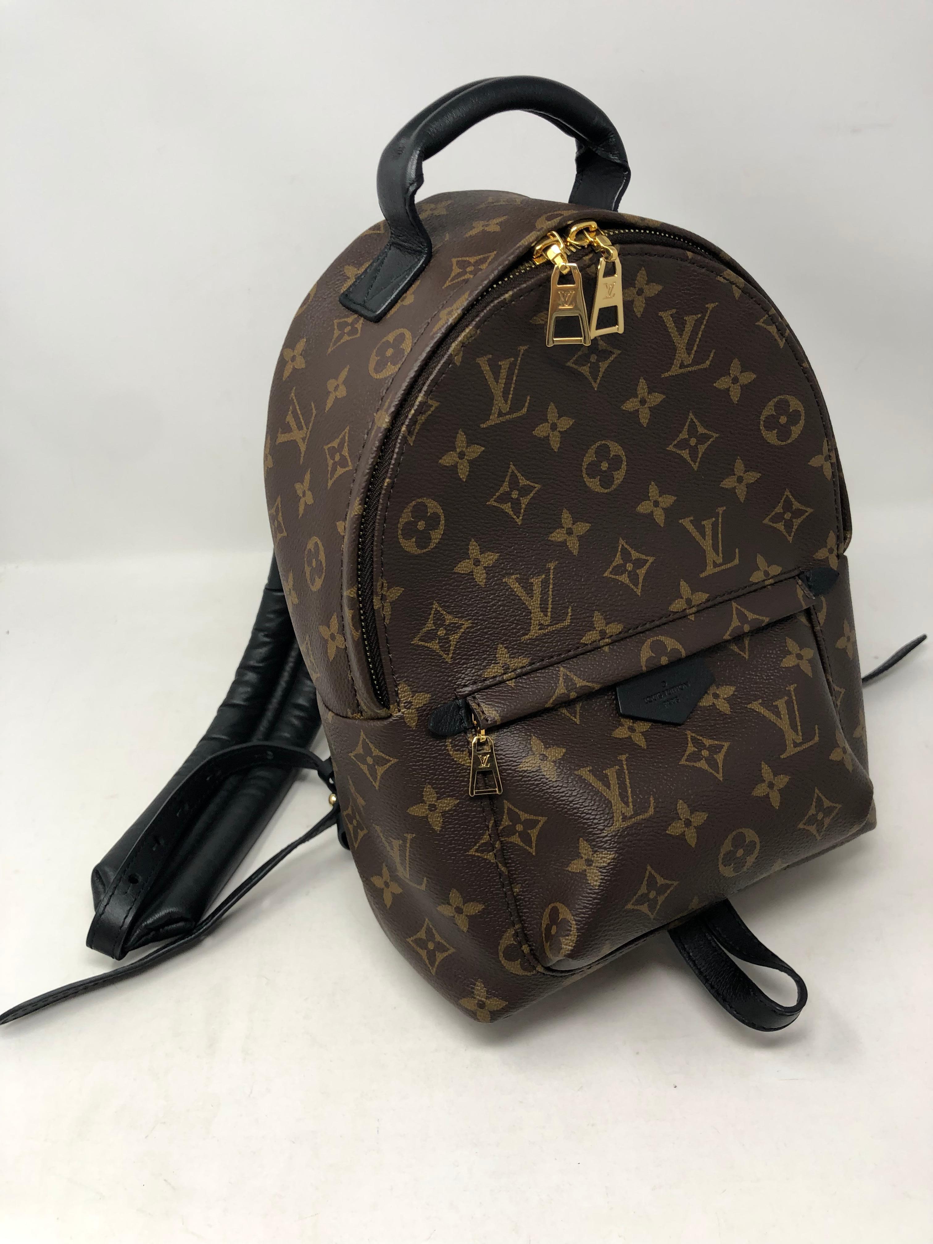 Louis Vuitton Palm Springs PM Backpack Monogram. Black leather shoulder straps and leather trim Backpack. PM size. Mint like new condition. Most wanted backpack. Sold out at LV. Don't miss out. Guaranteed authentic. 