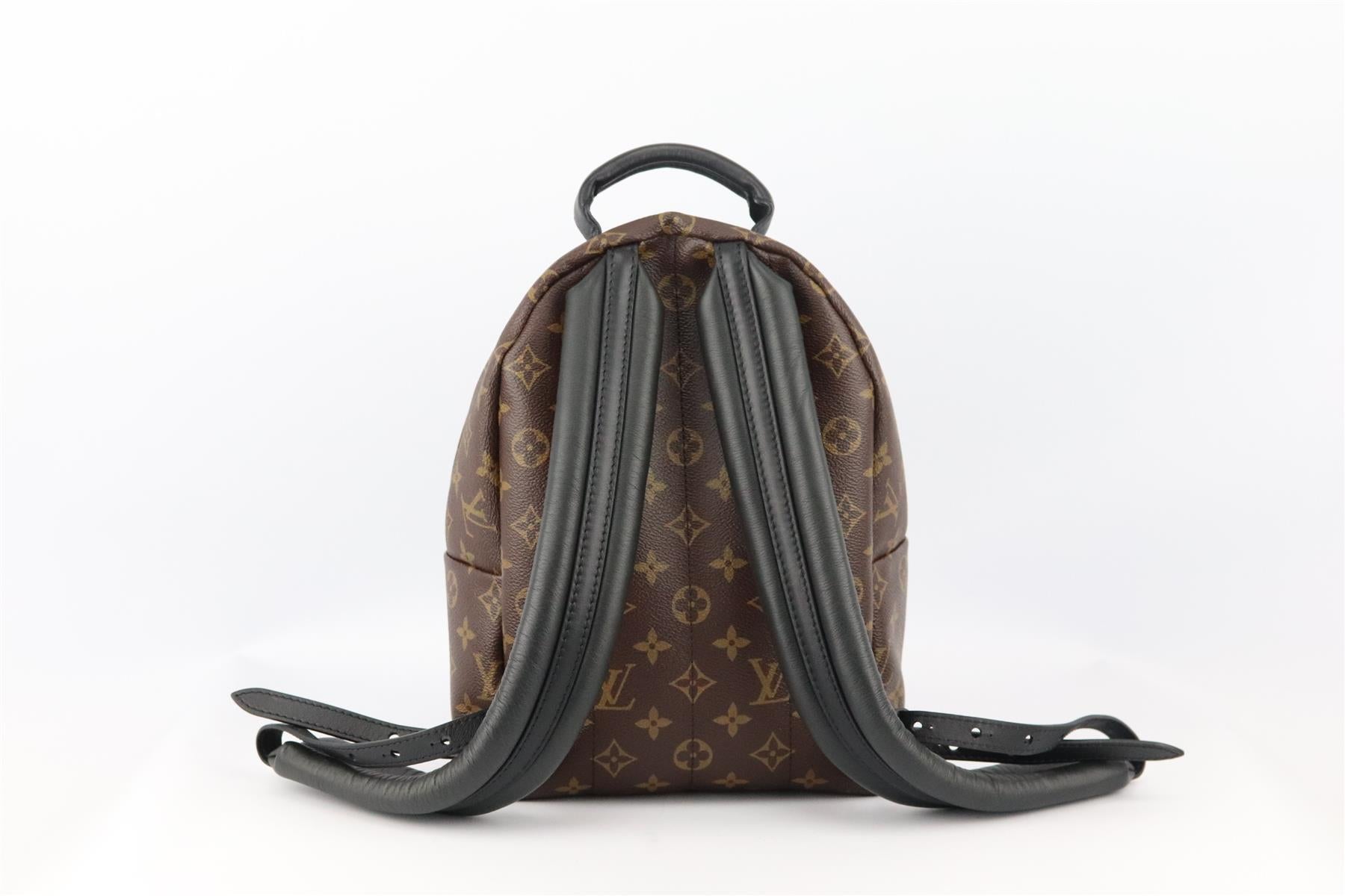 This ‘Palm Springs' PM backpack from Louis Vuitton has been made in the brand’s iconic Monogram print on coated canvas, it features a two-way zip with cushioned leather shoulder straps, it features a large internal compartment with large pocket.