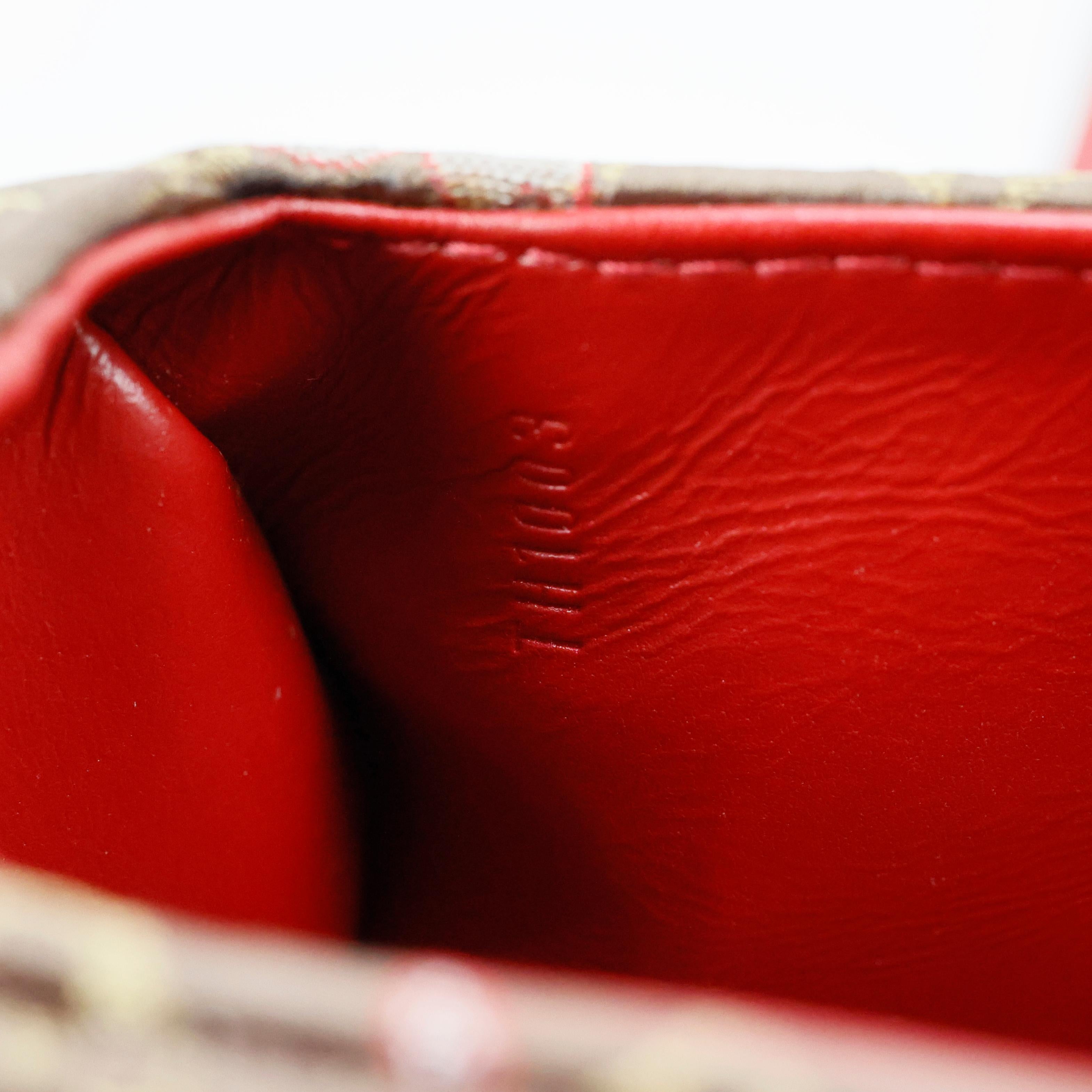 Louis Vuitton - Sac à monogramme en python de soie fleur de cerisier papillon en vente 1