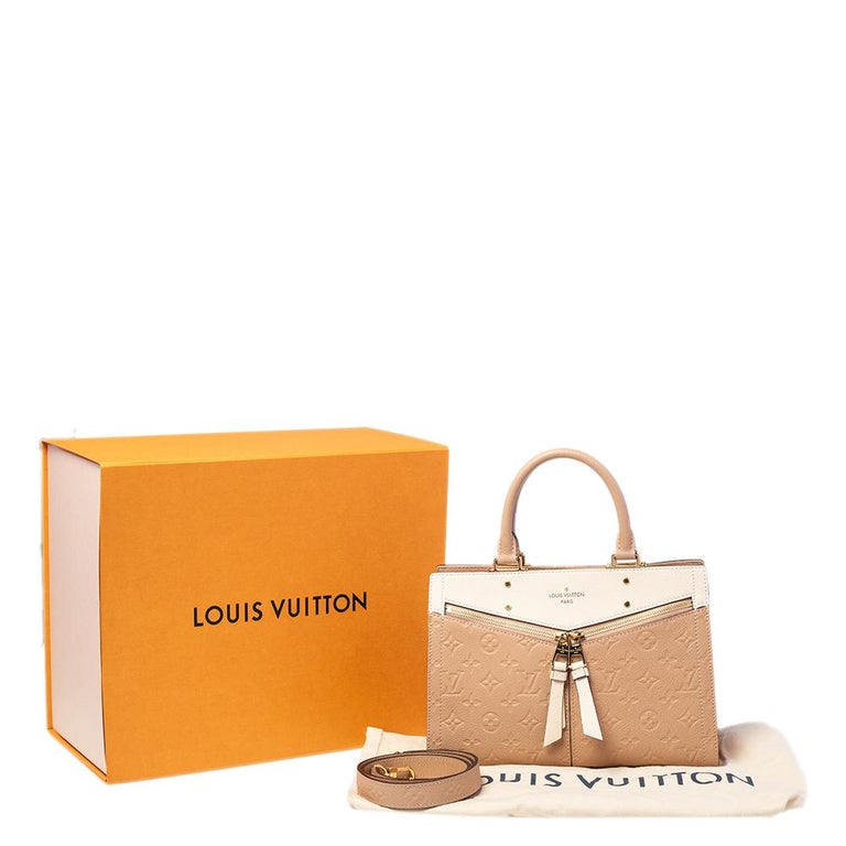 LOUIS VUITTON Beige Rose Cream Monogram Empreinte Leather Sully PM Bag