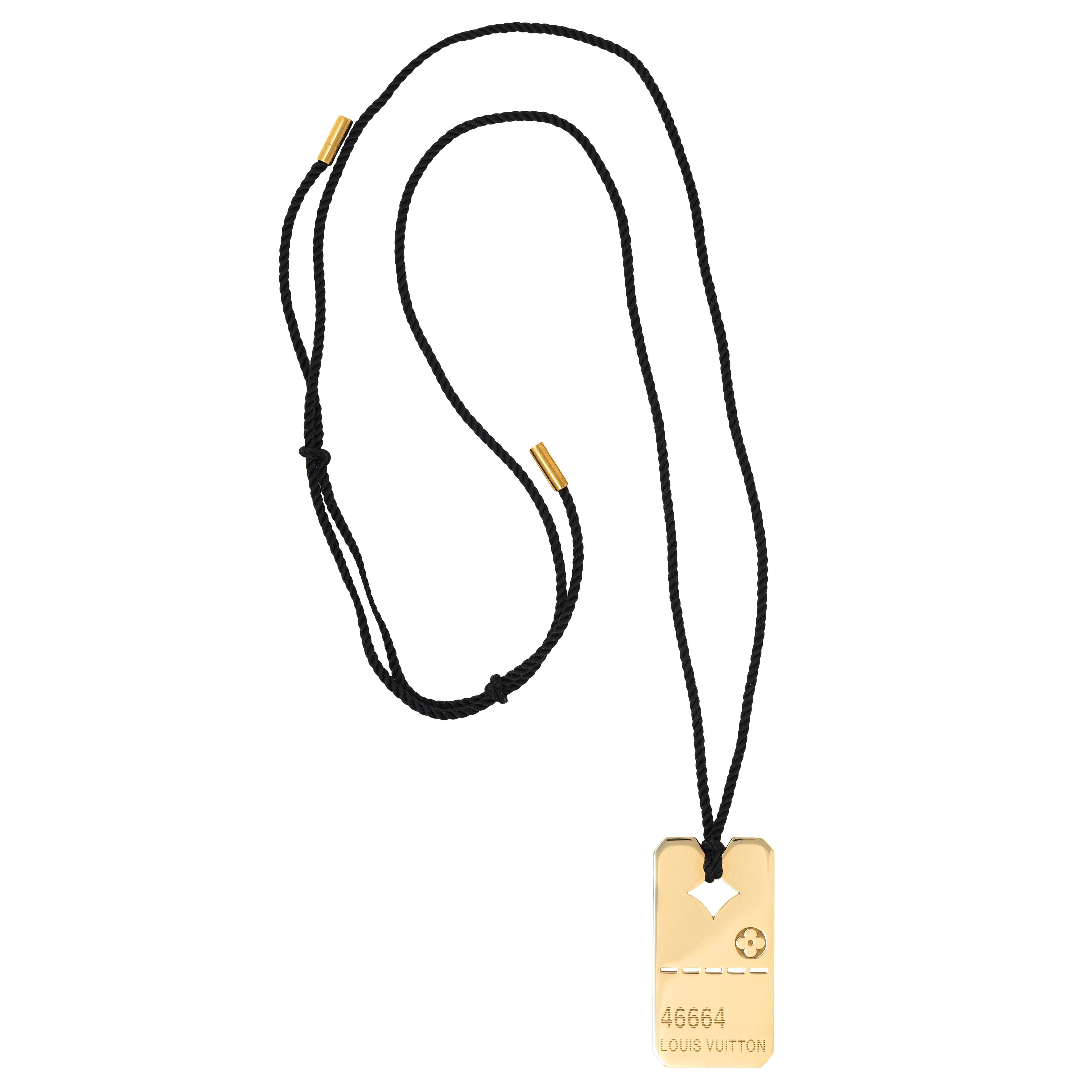 Louis Vuitton Paris 18 Karat Yellow Gold Logo Dog Tag Unisex Pendant Necklace In Excellent Condition For Sale In Philadelphia, PA