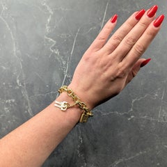 Bracciale Louis Vuitton Paris Contemporary in oro giallo 18 carati con lucchetto e chiavi