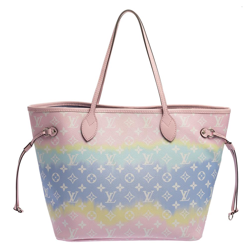Louis Vuitton’s Neverfull was first introduced in 2007, and even today it is a popular design. From the Escale collection, this gorgeous Neverfull comes crafted from tie-dye monogram coated canvas. The bag has drawstrings on the sides, a spacious