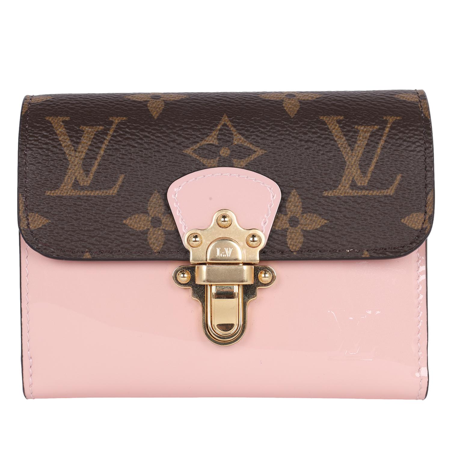 Authentic Louis Vuitton Patent Calfskin Monogram Cherrywood Compact Wallet Rose Ballerine Pink. This classic wallet features traditional monogram coated canvas and light pink patent leather. The front flap has a polished brass push lock. The front