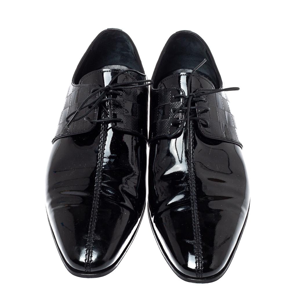 Take each step with style in these shoes from Louis Vuitton. Crafted from patent leather, they carry a modern design with a stylish Damier-embossed exterior and lace-ups. The insoles are leather-lined to provide comfort, and overall, the pair looks