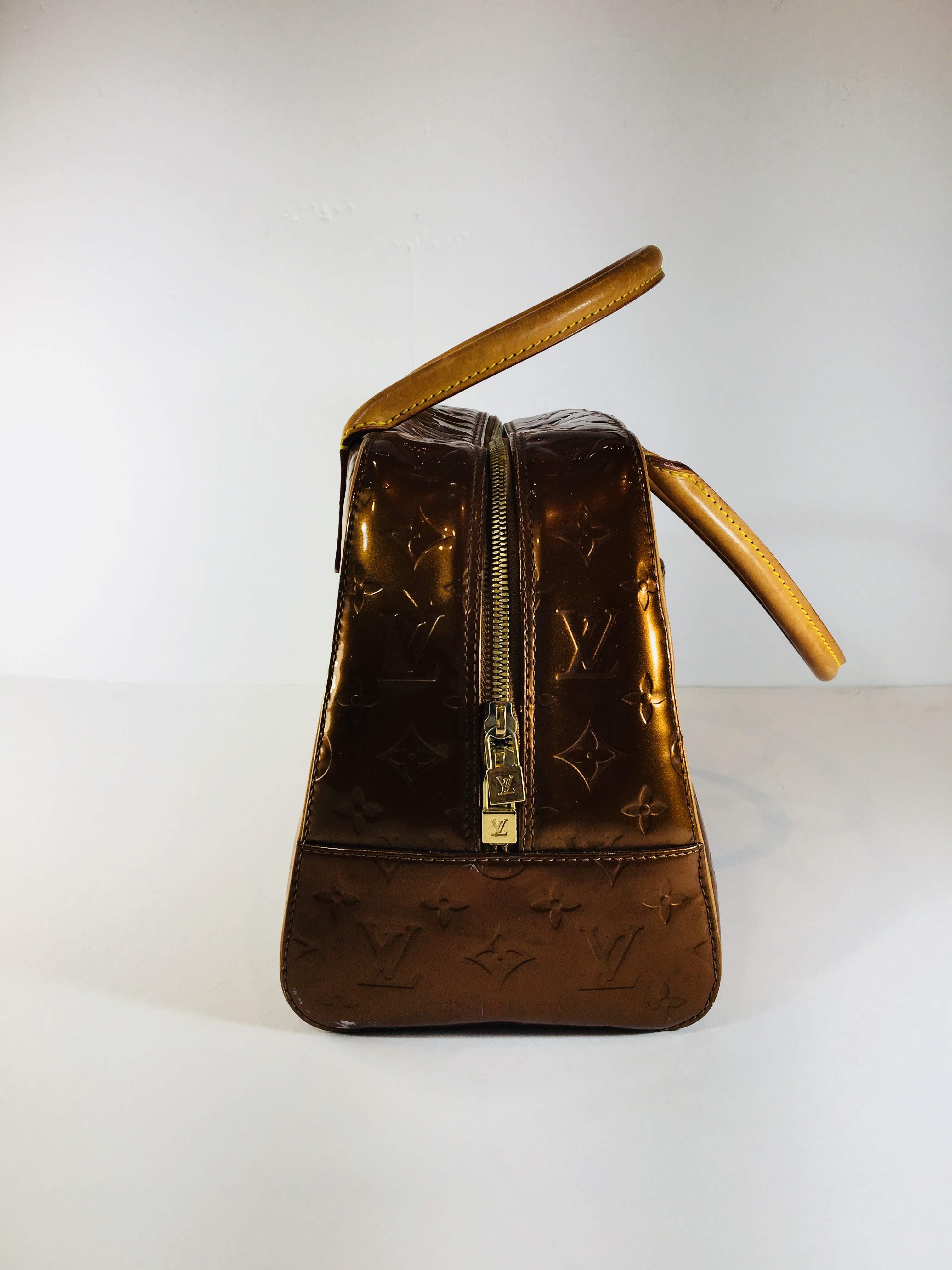 Copper Vernis Tompkins Patent Leather Handle Bag with Zipper Closure and Side Pocket 
14.50