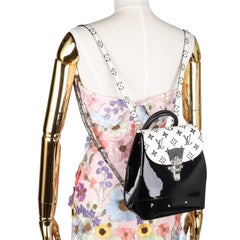 LOUIS VUITTON Patent Monogram Hot Springs Backpack