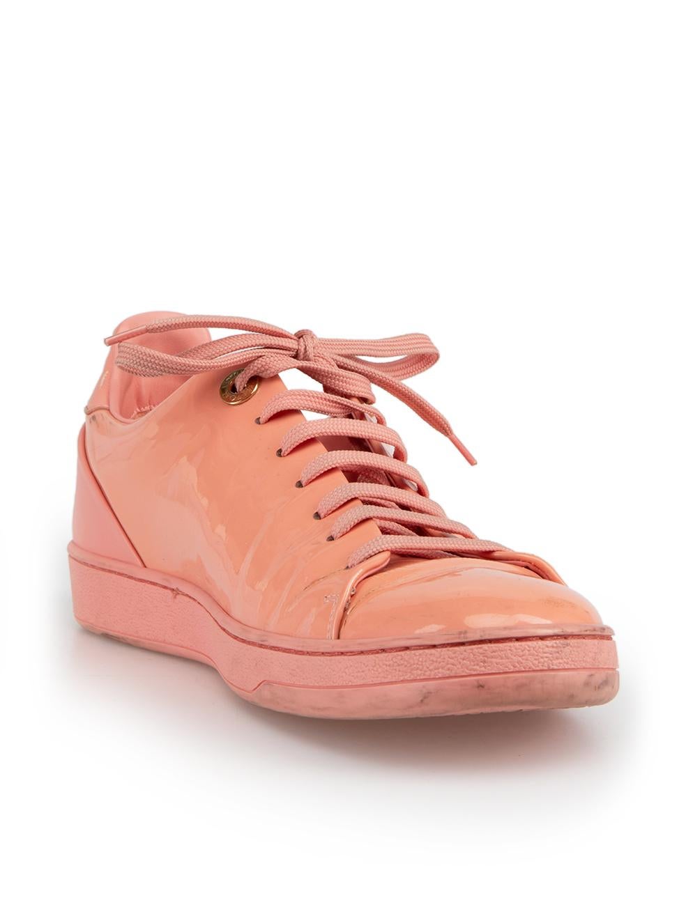 CONDITION is Very good. Minimal wear to shoes is evident. Minimal wear to top of shoes with marks and abrasions as well as the back leather tab with abrasions and there is some residue to the sole on the right sole on this used Louis Vuitton