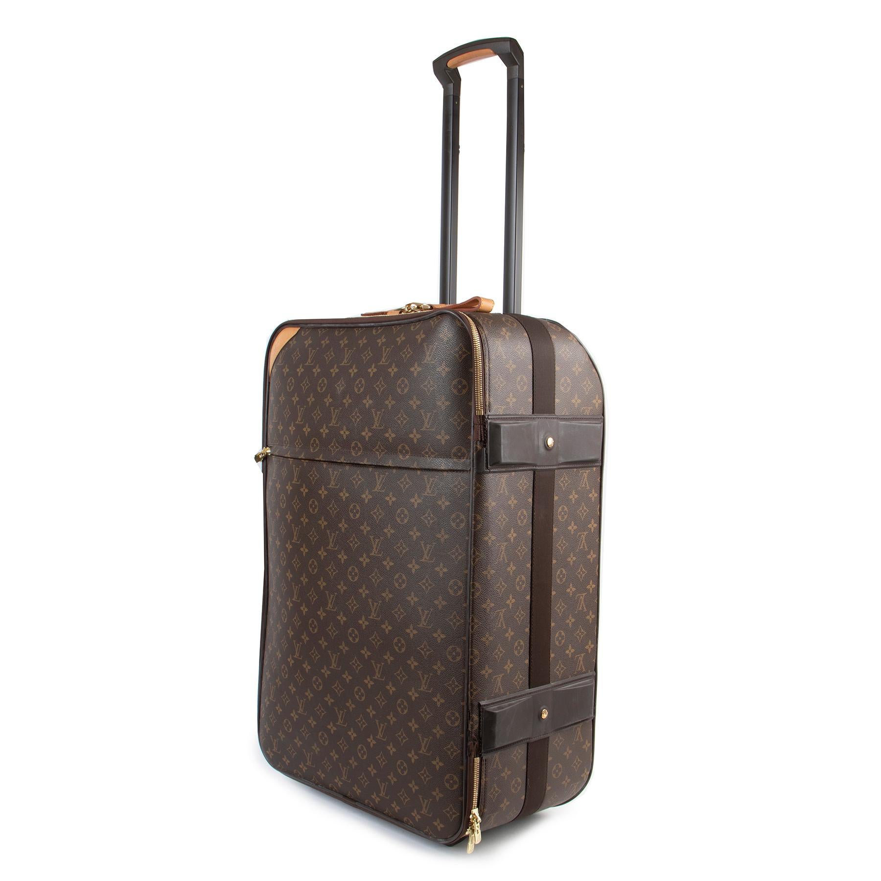 Louis Vuitton Pegase 65 Monogram Luggage Trolley

Travel in style with this stylish Louis Vuitton Pegase Trolley. This two-wheeled carry-on trolley features the brand's iconic Monogram and gold hardware details.

The interior consists of two