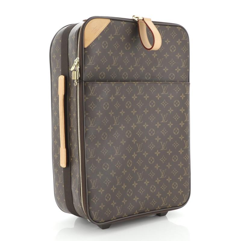 Condition: Very good. Moderate wear, scuffs, darkening and watermarks on leather trims and handles, scratches on hardware. 
Accessories: Keys, Lock, Garment Bag 
Measurements: Handle Drop 1