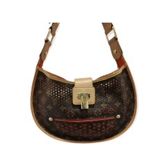 Louis Vuitton perforated monogram and orange leather shoulder bag
