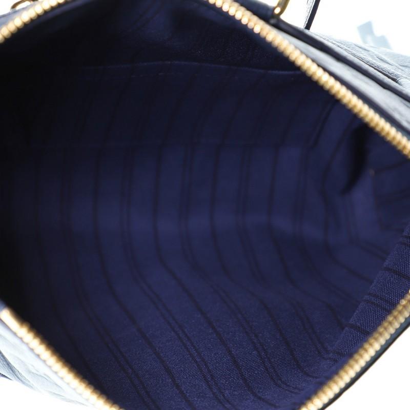 Louis Vuitton Petillante Clutch Monogram Empreinte Leather In Good Condition In NY, NY