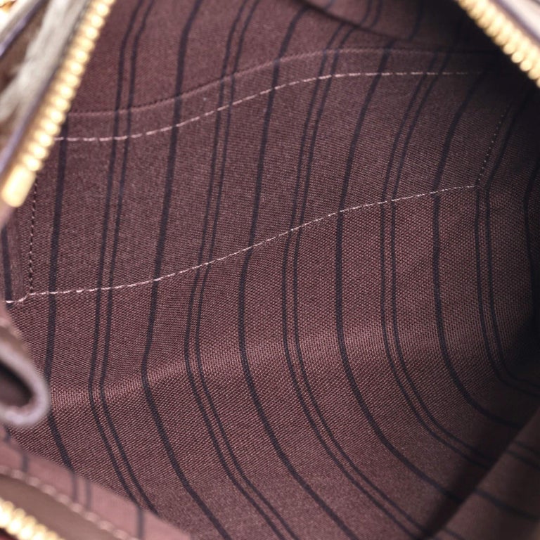 Louis Vuitton Monogram Empreinte Petillante Clutch - Brown