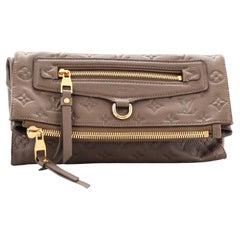 Louis Vuitton Petillante Clutch mit Monogramm aus Empreinte-Leder