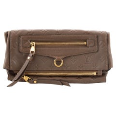 Louis Vuitton Petillante Clutch in Orage Reveal 