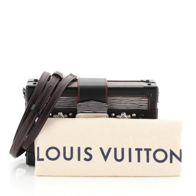 This Louis Vuitton Petite Malle Handbag Epi Leather, crafted in black and multicolor epi leather, features a detachable leather strap, leather trim, and black and silver-tone hardware. Its S-lock closure opens to a neutral leather interior with slip