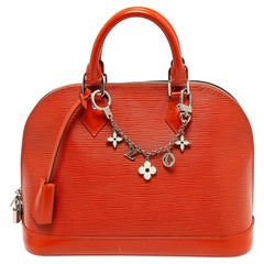 Used Louis Vuitton Piment Epi Leather Alma PM Bag