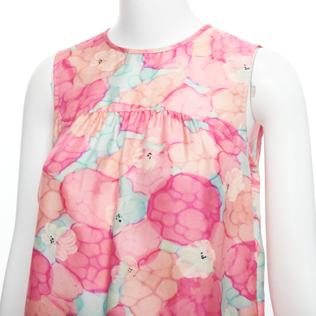 LOUIS VUITTON pink 100% silk watercolour floral print sleeveless top FR34 XS
Reference: LNKO/A02410
Brand: Louis Vuitton
Material: Silk
Color: Pink, Green
Pattern: Floral
Closure: Keyhole Button
Extra Details: Discreet LV logo at print.
Made in: