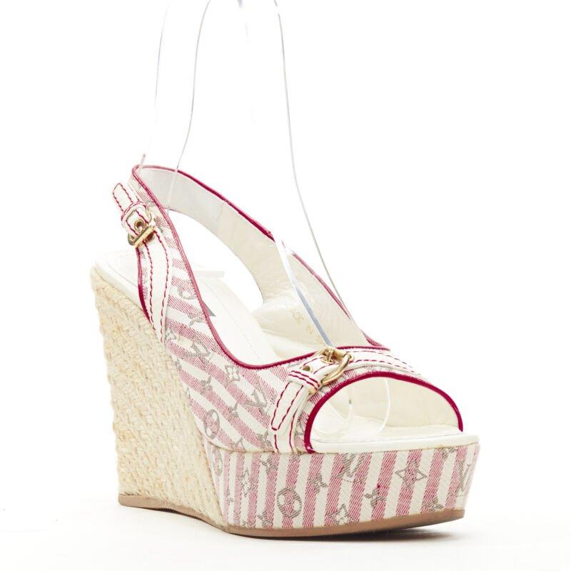 LOUIS VUITTON pink beige striped monogram jute espadrille wedge platform EU36.5
Reference: ANWU/A00976
Brand: Louis Vuitton
Designer: Marc Jacobs
Material: Fabric, Jute
Color: Pink, White
Pattern: Striped
Closure: Slingback
Lining:  Leather
Extra