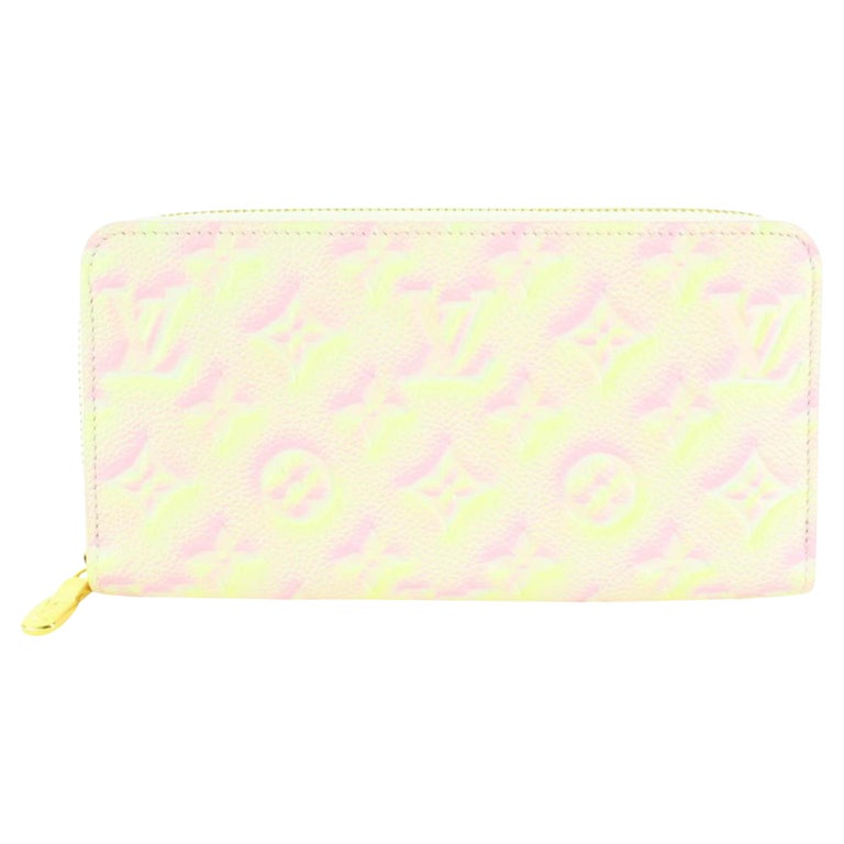 white and pink louis vuittons wallet