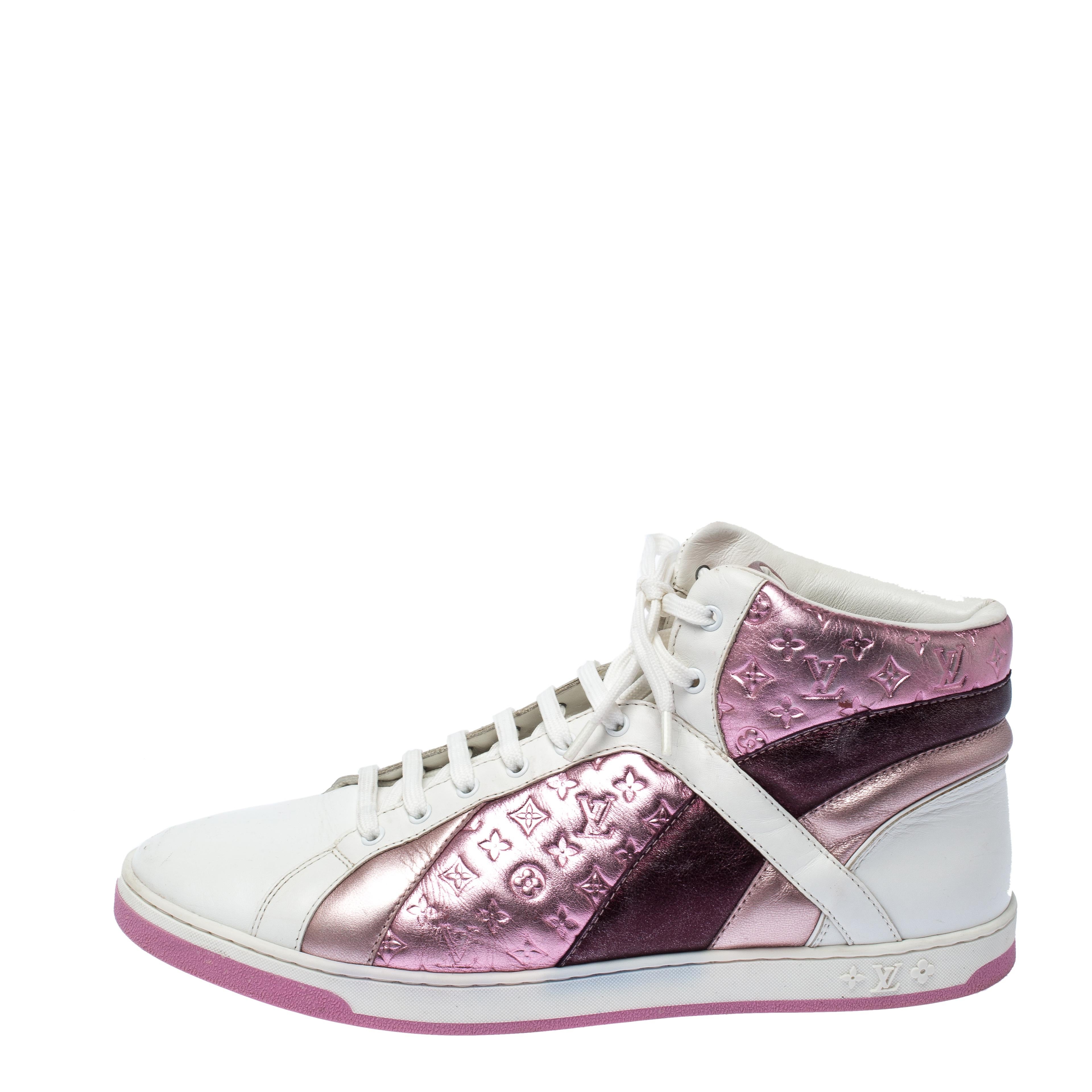 Feel great in your casual wear every time you step out in these sneakers from Louis Vuitton. They've been crafted from leather and styled with monogram accents, simple lace-ups and rubber soles. The sneakers are filled with comfort and effortless