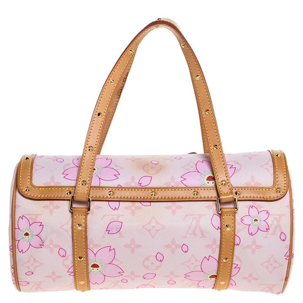 One of the most iconic shapes made by Louis Vuitton, the Papillon is a handbag that will remain stylish for years to come. The exterior of this limited-edition Cherry Blossom bag is made from Louis Vuitton's monogrammed canvas with contrast leather
