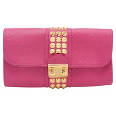 Louis Vuitton Pink Monogram Embossed Leather Courtney Clutch