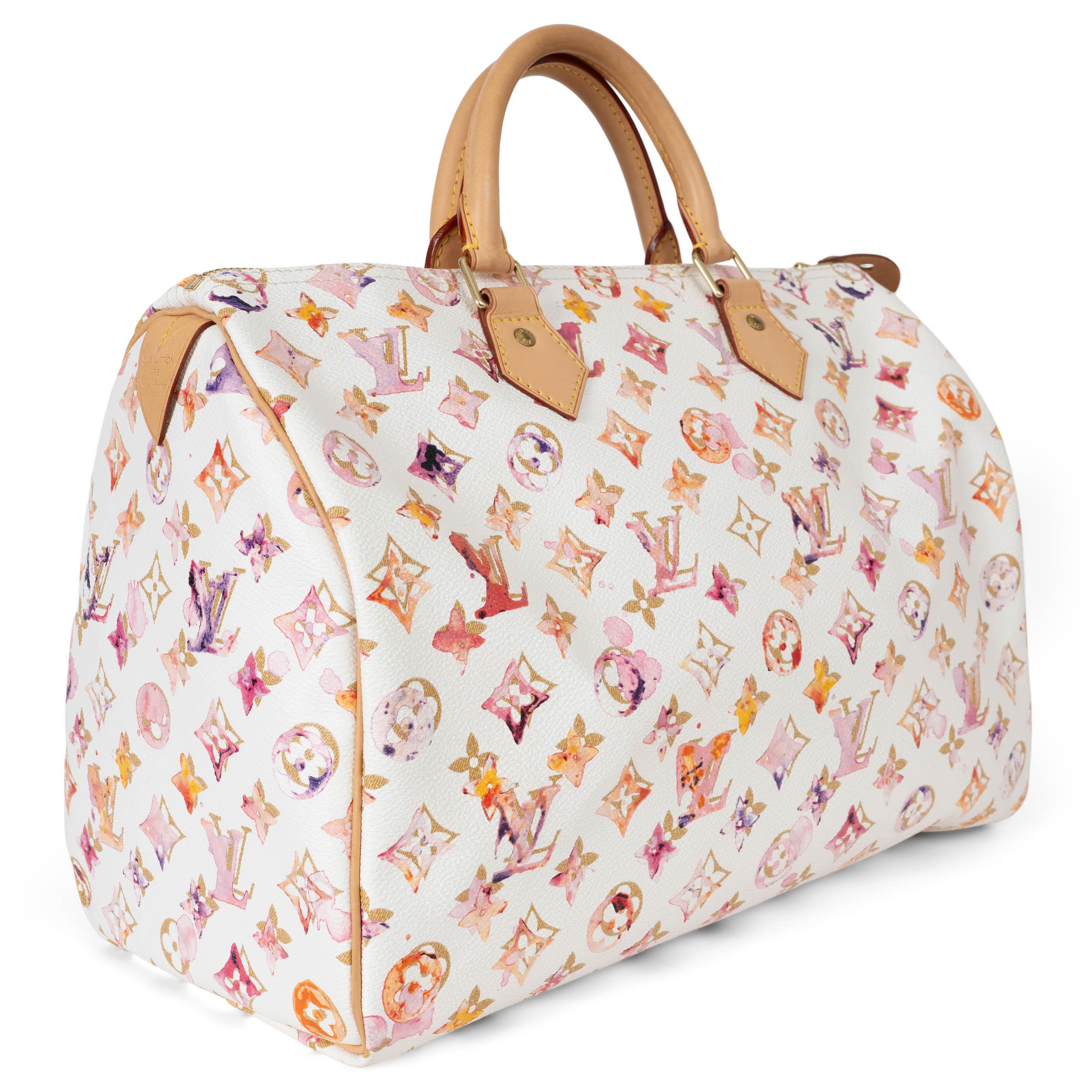 This 100% authentic Louis Vuitton x Richard Prince Speedy 35 from the Spring/Summer 2008 collection is a stunning collaboration that brings art to fashion. The bag features the unique watercolor monogram inspired by Richard Prince's paintings,
