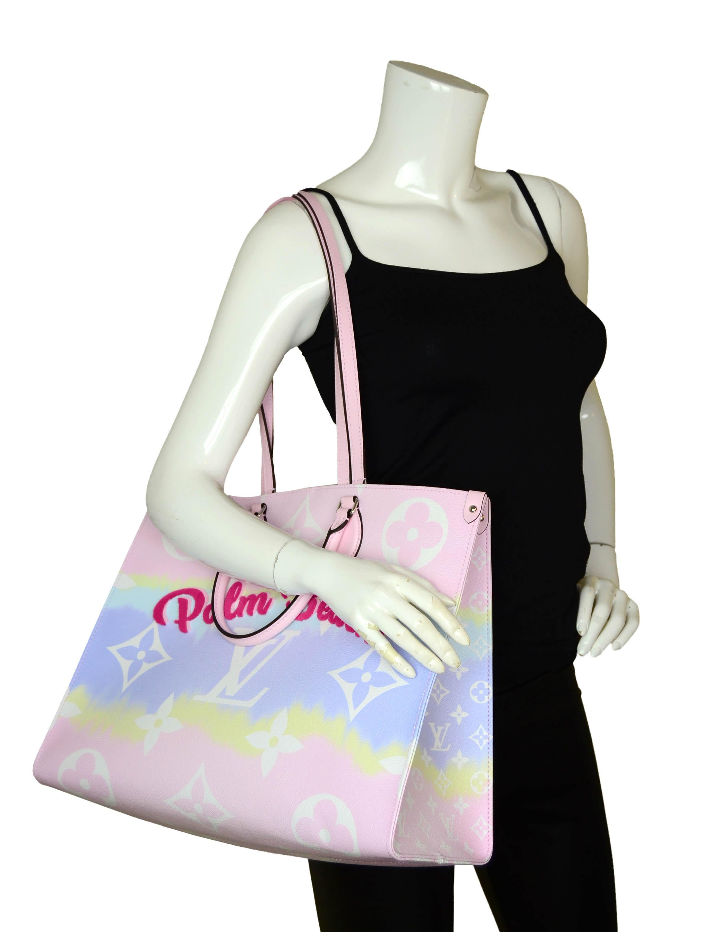 Louis Vuitton Limited Edition Pink Pastel Palm Beach Monogram Escale Onthego GM Tote Bag

Made In: France
Year of Production: 2020
Hardware: Silvertone
Materials: Coated canvas, leather
Lining: Monogram fabric
Closure/Opening: Open top with center