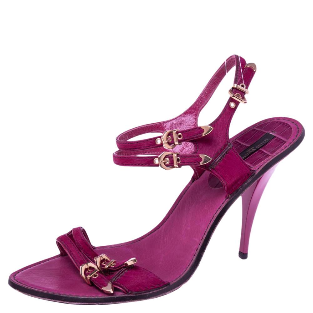 Look fashionably elegant in these ankle-strap sandals from Louis Vuitton. Crafted from pony hair, the pink beauties are truly a sight to behold! They flaunt stylish gold-tone buckles, leather-lined insoles, and high heels that will glam up your